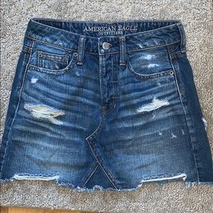 Denim skirt with rips